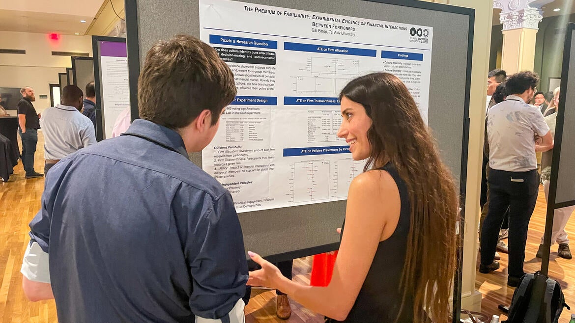 A woman presenting her research