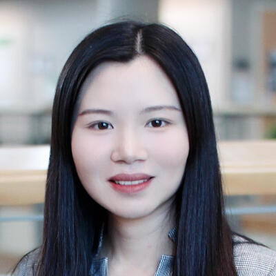 A headshot of Professor Wei Kang.